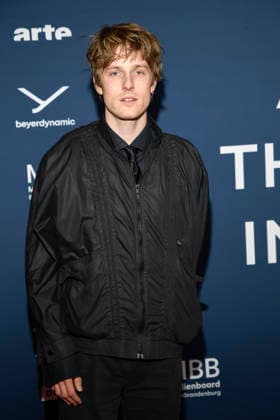 ABBberlin Louis Hofmann Actor on the red carpet at the festival opening AROUND THE WORLD IN 14 FILMS at Cinestar Kino in der Kulturbrauerei Berlin on 28 11 2025 Berlin Germany