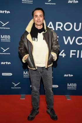 ABBberlin Nikolai Kinski actor as guest on the red carpet at the festival opening AROUND THE WORLD IN 14 FILMS at Cinestar Kino in der Kulturbrauerei Berlin on 28 11 2025 Berlin Germany
