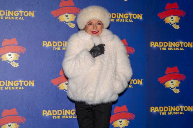 Paddington The Musical Word Premiere in London - 30 Nov 2025 Joan Collins seen arriving on the Blue Carpet during the Paddington The Musical World Premiere opens in the West End, London. London United Kingdom Copyright: xBonniexBritainx xSOPAxImagesx BNS02413
