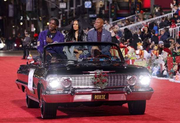 A. C. Green, Cecelia Scott and Byron Scott cruise down Hollywood Blvd. during The 93rd Annual Hollywood Christmas Parade With Grand Marshal Luke Wilson In Support of Marine Toys for Tots in Los Angeles on Sunday, November 30, 2025.  LAP20251130744 GERGxGRUDT
