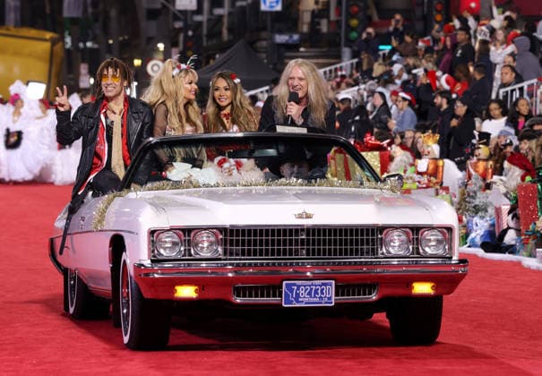 Jason Ebs, Janea Ebs, Suzanne Le Bach and Sebastian Bach cruise down Hollywood Blvd. during The 93rd Annual Hollywood Christmas Parade With Grand Marshal Luke Wilson In Support of Marine Toys for Tots in Los Angeles on Sunday, November 30, 2025.  LAP20251130751 GERGxGRUDT