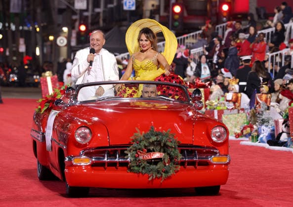 Jacob Meir and Connie Pena cruise down Hollywood Blvd. during The 93rd Annual Hollywood Christmas Parade With Grand Marshal Luke Wilson In Support of Marine Toys for Tots in Los Angeles on Sunday, November 30, 2025.  LAP20251130769 GERGxGRUDT