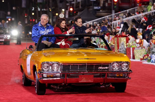 Rick Monday and Barbaralee Monday cruise down Hollywood Blvd. during The 93rd Annual Hollywood Christmas Parade With Grand Marshal Luke Wilson In Support of Marine Toys for Tots in Los Angeles on Sunday, November 30, 2025.  LAP20251130778 GERGxGRUDT