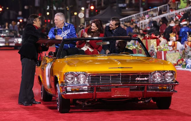 Rick Monday and Barbaralee Monday cruise down Hollywood Blvd. during The 93rd Annual Hollywood Christmas Parade With Grand Marshal Luke Wilson In Support of Marine Toys for Tots in Los Angeles on Sunday, November 30, 2025.  LAP20251130781 GERGxGRUDT