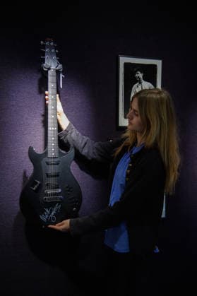 Bonhams Sound & Cinema: With Property from The Marianne Faithfull Estate Sale - Bonhams, London, UK - 1 December 2025 A staff member views A Signed Bond Electraglide Electric Guitar owned by Mick Jones of The Clash (est. Â£4k - Â£6k) which is on auction at Bonhams Sound & Cinema: With Property from The Marianne Faithfull Estate Sale ending from 3rd December 2025 at Bonhams in London, England, UK on Monday 1 December, 2025., Credit:Justin Ng Avalon UK, England, London, Bonhams  Copyright: xJustinxNgx xAvalonx 1055809873