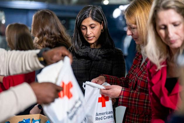 Second Lady Usha Vance (C), creates care packages for deployed Service members with volunteers with the American Red Cross, U.S. Government Cabinet spouses, military spouses an First Lady Melania Trump at Joint Base Andrews in Prince Georges County, Maryland on Monday, December 1, 2025.  WAP20251201334 BONNIExCASH