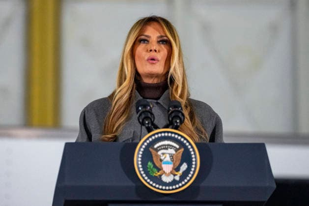 First Lady Melania Trump speaks before creating care packages for deployed Service members with Second Lady Usha Vance, the American Red Cross, U.S. Government Cabinet spouses and military spouses at Joint Base Andrews in Prince Georges County, Maryland on Monday, December 1, 2025.  WAP20251201340 BONNIExCASH