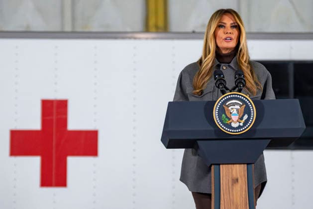 First Lady Melania Trump speaks before creating care packages for deployed Service members with Second Lady Usha Vance, the American Red Cross, U.S. Government Cabinet spouses and military spouses at Joint Base Andrews in Prince Georges County, Maryland on Monday, December 1, 2025.  WAP20251201342 BONNIExCASH