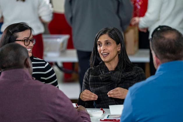 Second Lady Usha Vance (C) speaks with volunteers while creating care packages for deployed Service members with First Lady Melania Trump, the American Red Cross, U.S. Government Cabinet spouses and military spouses at Joint Base Andrews in Prince Georges County, Maryland on Monday, December 1, 2025.  WAP20251201351 BONNIExCASH