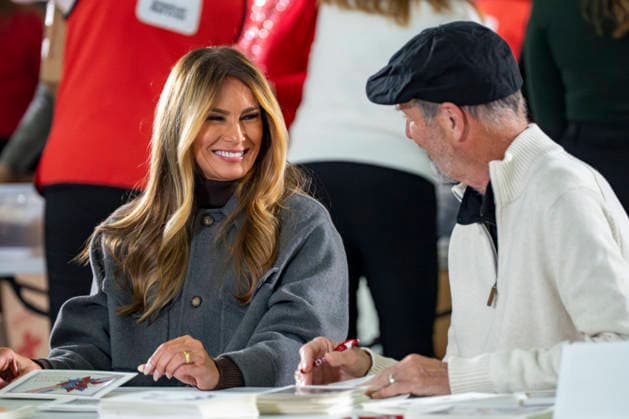 First Lady Melania Trump speaks with a volunteer while creating care packages for deployed Service members with Second Lady Usha Vance, the American Red Cross, U.S. Government Cabinet spouses and military spouses at Joint Base Andrews in Prince Georges County, Maryland on Monday, December 1, 2025.  WAP20251201360 BONNIExCASH