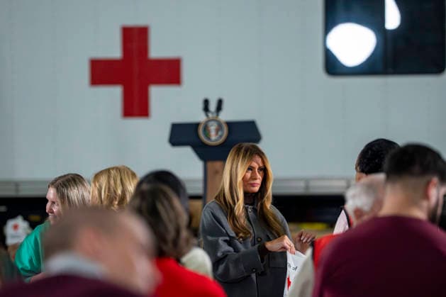 First Lady Melania Trump(C), creates care packages for deployed Service members with volunteers with the American Red Cross, U.S. Government Cabinet spouses, military spouses an Second Lady Usha Vance at Joint Base Andrews in Prince Georges County, Maryland on Monday, December 1, 2025.  WAP20251201349 BONNIExCASH
