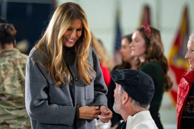 First Lady Melania Trump speaks with a volunteer while creating care packages for deployed Service members with Second Lady Usha Vance, the American Red Cross, U.S. Government Cabinet spouses and military spouses at Joint Base Andrews in Prince Georges County, Maryland on Monday, December 1, 2025.  WAP20251201365 BONNIExCASH
