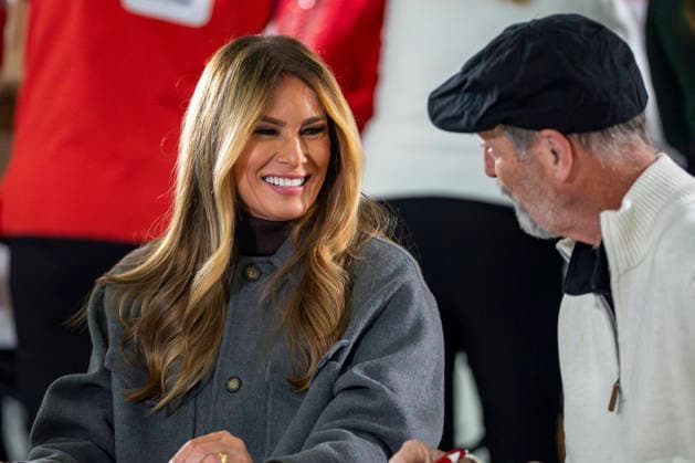 First Lady Melania Trump speaks with a volunteer while creating care packages for deployed Service members with Second Lady Usha Vance, the American Red Cross, U.S. Government Cabinet spouses and military spouses at Joint Base Andrews in Prince Georges County, Maryland on Monday, December 1, 2025.  WAP20251201359 BONNIExCASH
