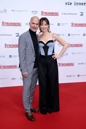 Christoph Maria Herbst and Milena Dreissig at the movie premiere of Stromberg Everything as usual again on 1 12 2025 at Zoo Palst in Berlin Stromberg movie premiere in Berlin