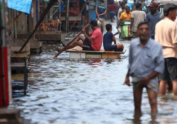 Cyclone Ditwah Causes Flooding In Colombo Children paddle a makeshift raft through floodwaters in a submerged neighborhood in Colombo, Sri Lanka, on December 1, 2025. The Disaster Management Center confirms that the death toll from adverse weather caused by Cyclone Ditwah rises to 366, with more than 1.1 million people affected nationwide. Colombo Sri Lanka  Copyright: xTharakaxBasnayakax originalFilename: basnayaka-notitle251201_npzeM.jpg