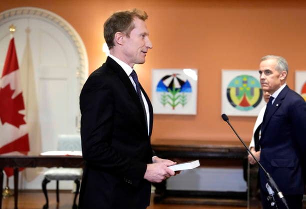 December 1, 2025, Ottawa, On, CAN: Mark Miller is sworn in as Minister of Canadian Identity and Culture and Minister responsible for Official Languages as Prime Minister Mark Carney looks on, at a cabinet swearing in ceremony at Rideau Hall in Ottawa, on Monday, Dec. 1, 2025. Ottawa CAN  - ZUMAc35_ 20251201_zaf_c35_031 Copyright: xJustinxTangx