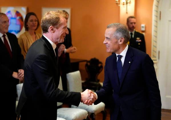 December 1, 2025, Ottawa, On, CAN: Mark Miller shakes hands with Prime Minister Mark Carney after being sworn in as Minister of Canadian Identity and Culture and Minister responsible for Official Languages at a cabinet swearing in ceremony at Rideau Hall in Ottawa, on Monday, Dec. 1, 2025. Ottawa CAN  - ZUMAc35_ 20251201_zaf_c35_032 Copyright: xJustinxTangx