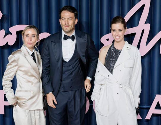 British Fashion Awards Gala Nigth - Red carpet LONDON, UK - DECEMBER 01: Camilla Cucinelli, Riccardo Stefanelli, Carolina Cucinelli poses at the photocall of British Fashion Awards held at Royal Albert Hall, on December 01st 2025 in London, Great Britain. Photo Marco Piovanotto Abacapress.com  Copyright: xPiovanottoxMarco ABACAx