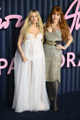 Celebrities attending the Fashion Awards 2025 at the Royal Albert Hall, London Featuring: Sienna Miller and Charlotte Tilbury Where: London, United Kingdom When: 01 Dec 2025 Credit: Cover Images **NOT AVAILABLE FOR HELLO MAGAZINE** EDITORIAL USE ONLY. NOT FOR USE BY NEWSPAPERS BASED IN THE UK. Copyright: xx coverimg55306046