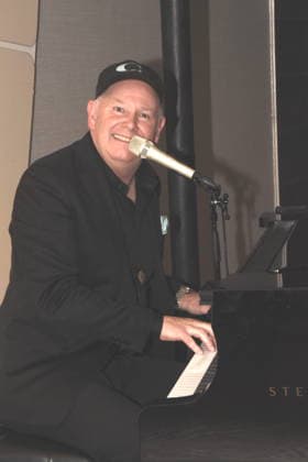 Charlie Glass Pianist Saenger Muenchen 01 12 2025 Hotel Vierjahreszeiten Kempinski Book Presentation by Fritz Egner Presenter My Life Between Rhythm and Blues in Munich Photo Muenchen
