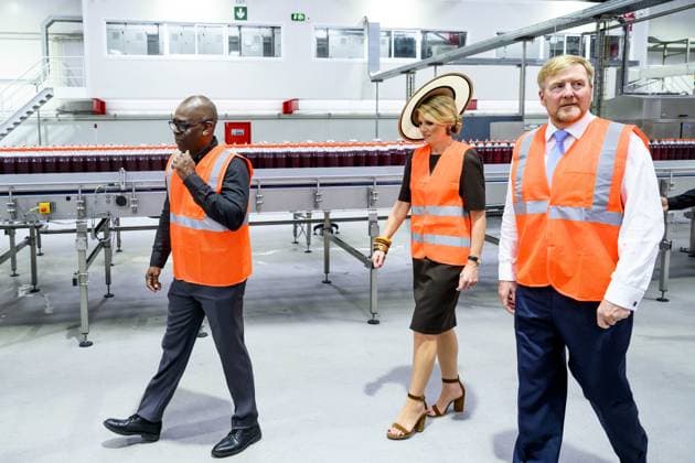 Paramaribo, The Netherlands, 2025-12-02 14:13:14 PARAMARIBO, December 2, 2025, Fernandes. King Willem-Alexander and Queen Maxima are paying a state visit to the Republic of Suriname at the invitation of President Jennifer Geerlings-Simons. At the Fernandes family business s bottling plant, King Willem-Alexander and Queen Maxima will be given a tour of the modern facility, where they will be given an explanation of the bottling process for Suriname s most famous drink. PHOTO: NLBeeld Patrick van Emst Credit: NL Beeld Patrick van Emst  Copyright: xx x