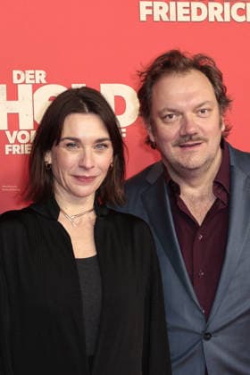 Christiane Paul and Charly Huebner at the öDer Held vom Bahnhof Friedrichstrasse cinema premiere on 2 12 2025 at the Delphi Filmpalast in Berlin Der Held vom Bahnhof Friedrichstrasse film premiere in Berlin