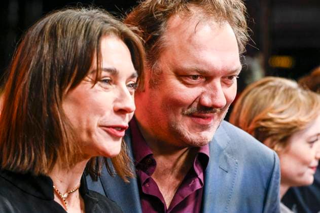 ABBberlin Christiane Paul with Charly Hübner Huebner Actor on the red carpet at the world premiere of the movie DER HELD VOM BAHNHOF FRIEDRICHSTRASSE at Delphi Filmpalast Berlin on 02 12 2025 Berlin Germany