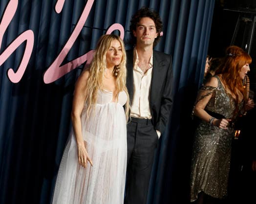 December 1, 2025, London, United Kingdom: Sienna Miller and Oli Green attend The Fashion Awards 2025 at the Royal Albert Hall in Kensington, London. London United Kingdom - ZUMAs197 20251201_aaa_s197_664 Copyright: xCatxMorleyx