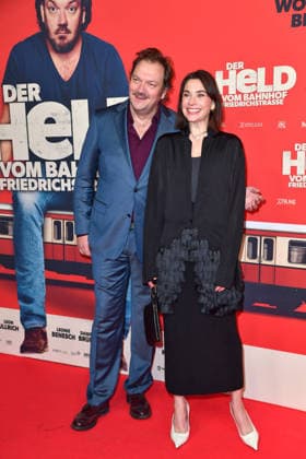 Charly Hübner and Christiane Paul at the premiere of DER HELD VOM BAHNHOF FRIEDRICHSTRASSE at the Delphi Filmpalast in Berlin 02 12 2025