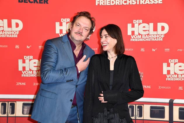 Charly Hübner and Christiane Paul at the premiere of DER HELD VOM BAHNHOF FRIEDRICHSTRASSE at the Delphi Filmpalast in Berlin 02 12 2025