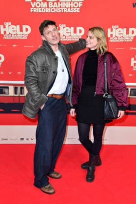 Hendrik Duryn and Rike Schmid at the premiere of DER HELD VOM BAHNHOF FRIEDRICHSTRASSE at the Delphi Filmpalast in Berlin 02 12 2025