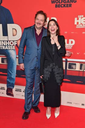 Charly Hübner and Christiane Paul at the premiere of DER HELD VOM BAHNHOF FRIEDRICHSTRASSE at the Delphi Filmpalast in Berlin 02 12 2025