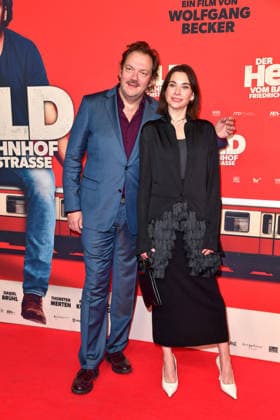 Charly Hübner and Christiane Paul at the premiere of DER HELD VOM BAHNHOF FRIEDRICHSTRASSE at the Delphi Filmpalast in Berlin 02 12 2025