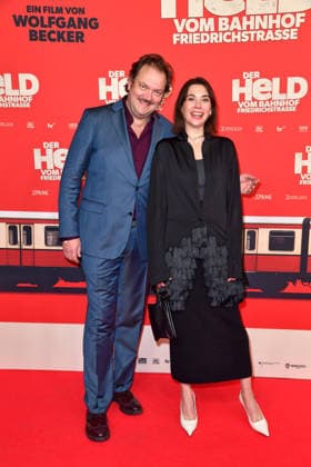 Charly Hübner and Christiane Paul at the premiere of DER HELD VOM BAHNHOF FRIEDRICHSTRASSE at the Delphi Filmpalast in Berlin 02 12 2025