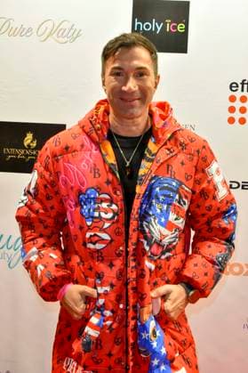 ABBkoeln Lucas Cordalis German singer wears a red colored coat as a guest at Katys X Mas Wonderland Christmas Party at Wolkenburg on 02 12 2025 in Cologne NRW Germany