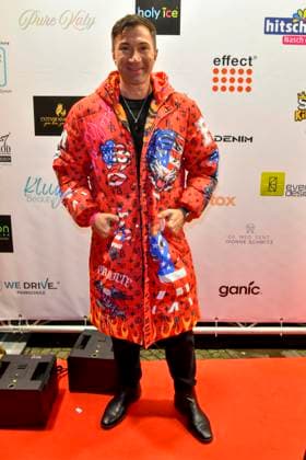 ABBkoeln Lucas Cordalis German singer wears a red colored coat as a guest at Katys X Mas Wonderland Christmas Party at Wolkenburg on 02 12 2025 in Cologne NRW Germany
