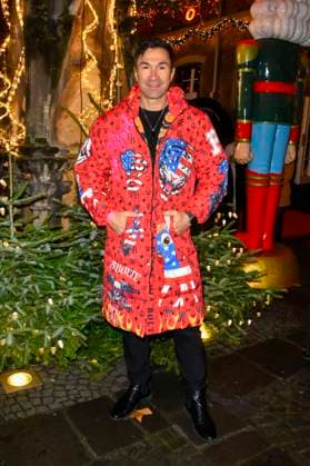 ABBkoeln Lucas Cordalis German singer wears a red colored coat as a guest at Katys X Mas Wonderland Christmas Party at Wolkenburg on 02 12 2025 in Cologne NRW Germany