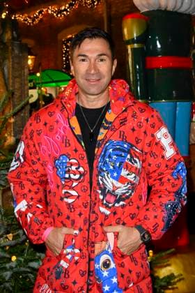 ABBkoeln Lucas Cordalis German singer wears a red colored coat as a guest at Katys X Mas Wonderland Christmas Party at Wolkenburg on 02 12 2025 in Cologne NRW Germany