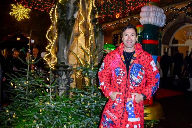 ABBkoeln Lucas Cordalis German singer wears a red colored coat as a guest at Katys X Mas Wonderland Christmas Party at Wolkenburg on 02 12 2025 in Cologne NRW Germany