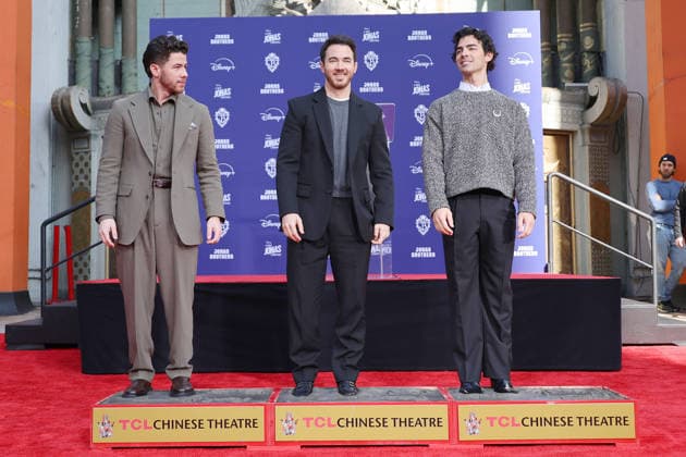 December 3, 2025, Los Angeles, California, USA: Nick Jonas, Kevin Jonas, Joe Jonas at a ceremony honoring the Jonas Brothers with hand and foot prints at the TCL Chinese Theatre IMAX. Los Angeles USA - ZUMAg107 20251203_zep_g107_019 Copyright: xNinaxPrommerx
