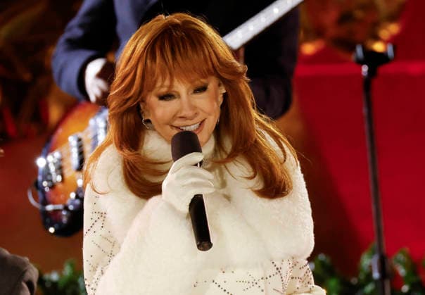 Reba McEntire performs at the 93rd annual Rockefeller Center Christmas Tree lighting ceremony takes place in New York City on Wednesday, December 3, 2025. The 75-foot-tall Norway Spruce came from a home in East Greenbush, New York.  NYP20251203109 JOHNxANGELILLO