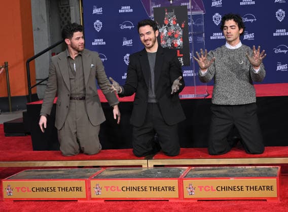 Jonas Brothers Hand and Footprint Ceremony Nick Jonas, Kevin Jonas and Joe Jonas at the Jonas Brothers Hand and Footprint In Cement Ceremony held at the TCL Chinese Theatre on December 3, 2025 in Hollywood, Ca. Hollywood TCL Chinese Theatre California USA Copyright: xLeexWatt AFF-USA.COMx