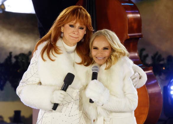Reba McEntire and Kristin Chenoweth perform at the 93rd annual Rockefeller Center Christmas Tree lighting ceremony takes place in New York City on Wednesday, December 3, 2025. The 75-foot-tall Norway Spruce came from a home in East Greenbush, New York.  NYP20251203114 JOHNxANGELILLO