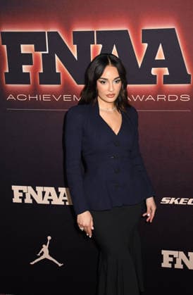 NEW YORK, NY - DECEMBER 3: Amina Muaddi at the 2025 Footwear News Achievement Awards at Cipriani 25 on December 3, 2025 in New York City. Copyright: xMediaPunchx