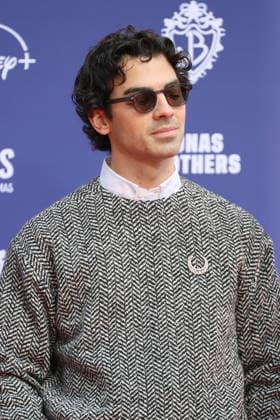 December 3, 2025, Los Angeles, California, USA: Joe Jonas at a ceremony honoring the Jonas Brothers with hand and foot prints at the TCL Chinese Theatre IMAX. Los Angeles USA - ZUMAg107 20251203_zep_g107_041 Copyright: xNinaxPrommerx