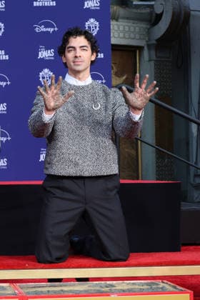 December 3, 2025, Los Angeles, California, USA: Joe Jonas at a ceremony honoring the Jonas Brothers with hand and foot prints at the TCL Chinese Theatre IMAX. Los Angeles USA - ZUMAg107 20251203_zep_g107_043 Copyright: xNinaxPrommerx