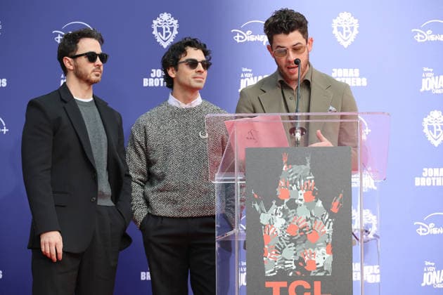 December 3, 2025, Los Angeles, California, USA: Kevin Jonas, Joe Jonas, Nick Jonas at a ceremony honoring the Jonas Brothers with hand and foot prints at the TCL Chinese Theatre IMAX. Los Angeles USA - ZUMAg107 20251203_zep_g107_048 Copyright: xNinaxPrommerx
