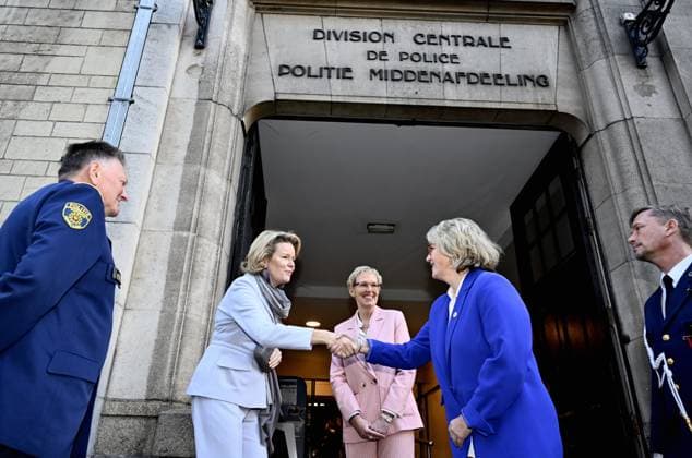 Queen Mathilde of Belgium (CL) and Brussels Minister Karine Lalieux (C) pictured at a royal visit to the Emergency Victim Assistance (EVA) unit of the Brussels Capital Ixelles police zone, Thursday 04 December 2025. The visit follows the round table discussion on domestic violence held at the Royal Palace on 4 November.  ERICxLALMAND 146407365