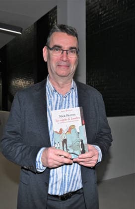 Milan, Italy Mick Herron receives the Raymond Chandler Award at the Noir in Festival with a masterclass at IULM. In the photo: Mick Herron with his book presented at the Noir in Festival.  Copyright: xNickxZonnax xipa-agency.netx xNickxZonnax IPA_Agency_IPA68737787