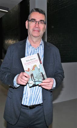 Milan, Italy Mick Herron receives the Raymond Chandler Award at the Noir in Festival with a masterclass at IULM. In the photo: Mick Herron with his book presented at the Noir in Festival.  Copyright: xNickxZonnax xipa-agency.netx xNickxZonnax IPA_Agency_IPA68737788